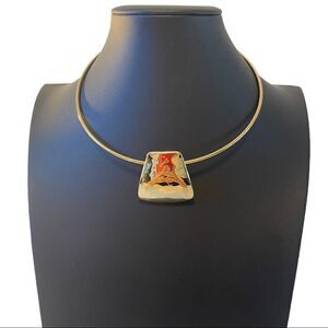 Simply Elegant Gold Toned Slider with Rounded Trapezoid Shaped Pendant.